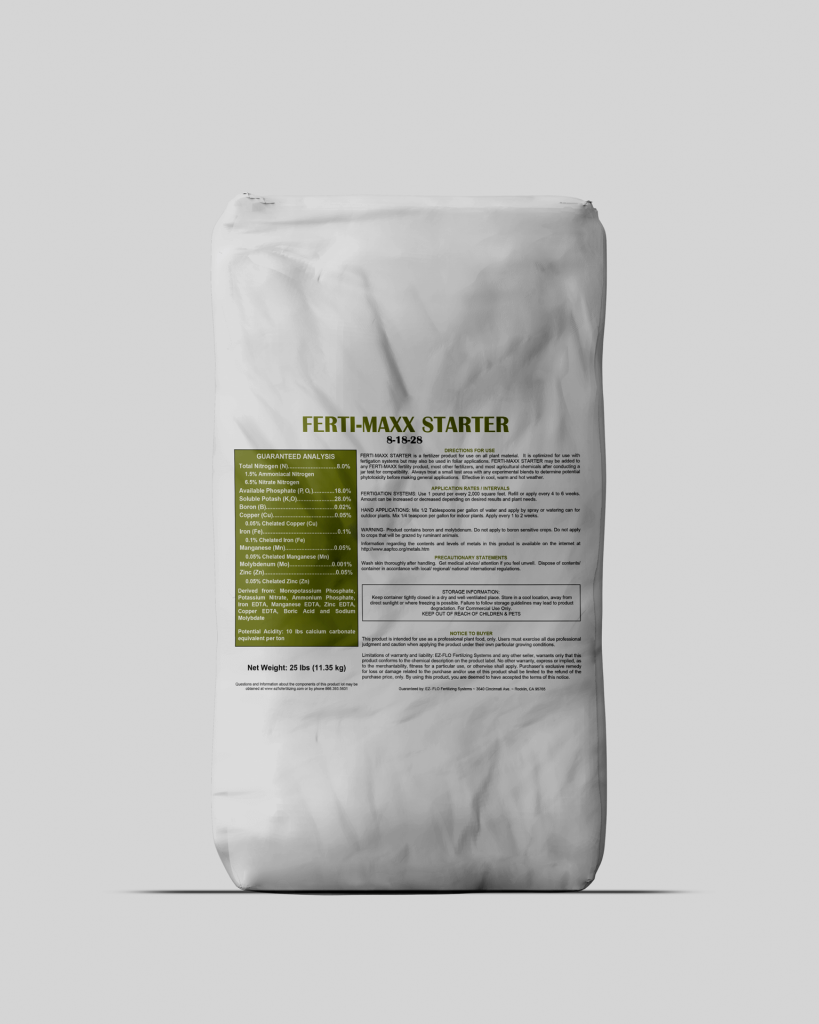 A white bag labeled "Ferti-Maxx Starter 5-15-28" 2960, with product information and instructions printed in black and green text.