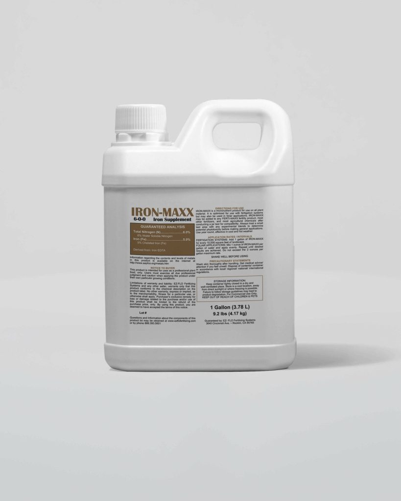 A white plastic gallon jug labeled "IRON-MAXX 6-0-0" with product details and instructions printed on the front, featuring Import placeholder 2968 for easy identification.
