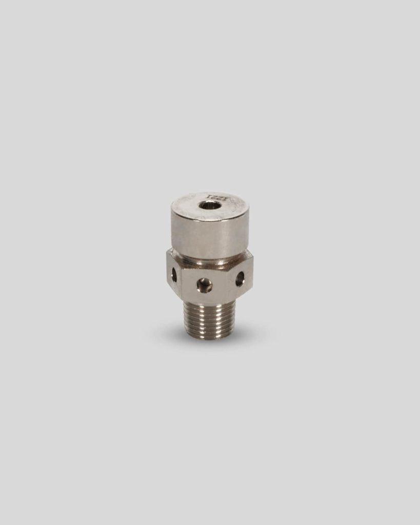 A metal industrial valve, model 1133, with a hexagonal base and threaded bottom is shown against a plain light gray background.