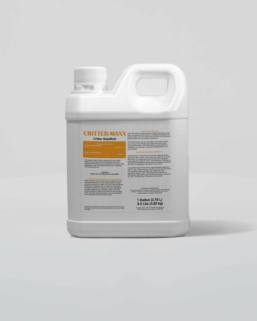 A white plastic 1-gallon container with a handle and cap, labeled “CRITTER-MAXX Critter Repellent import 2992,” features detailed usage instructions and information printed on the front.