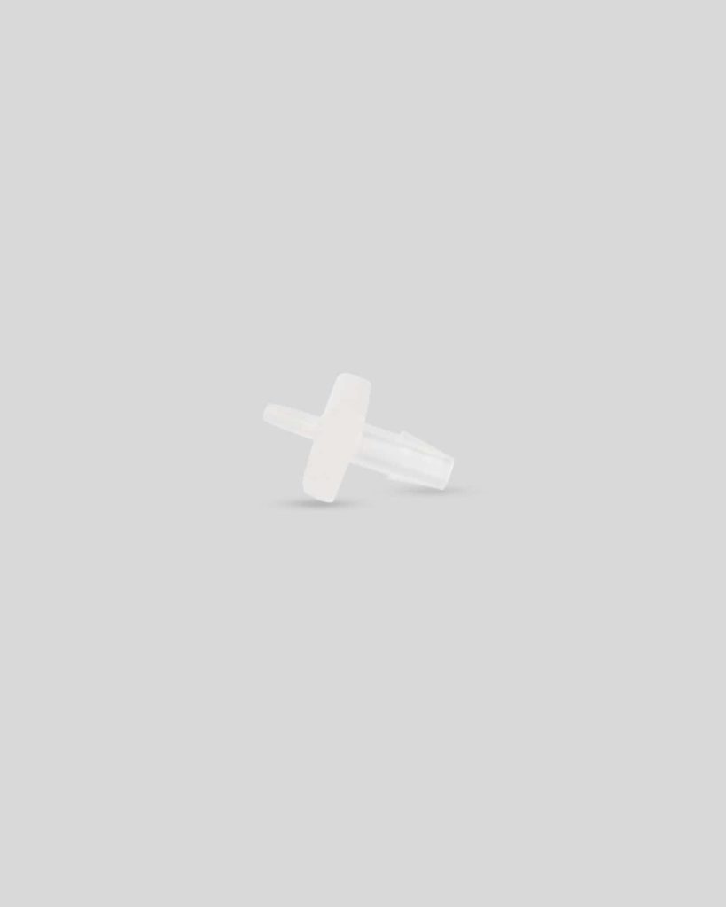 A small, translucent plastic barbed check valve with a T-shaped design, marked with "1140 import placeholder," is centered on a plain light gray background.