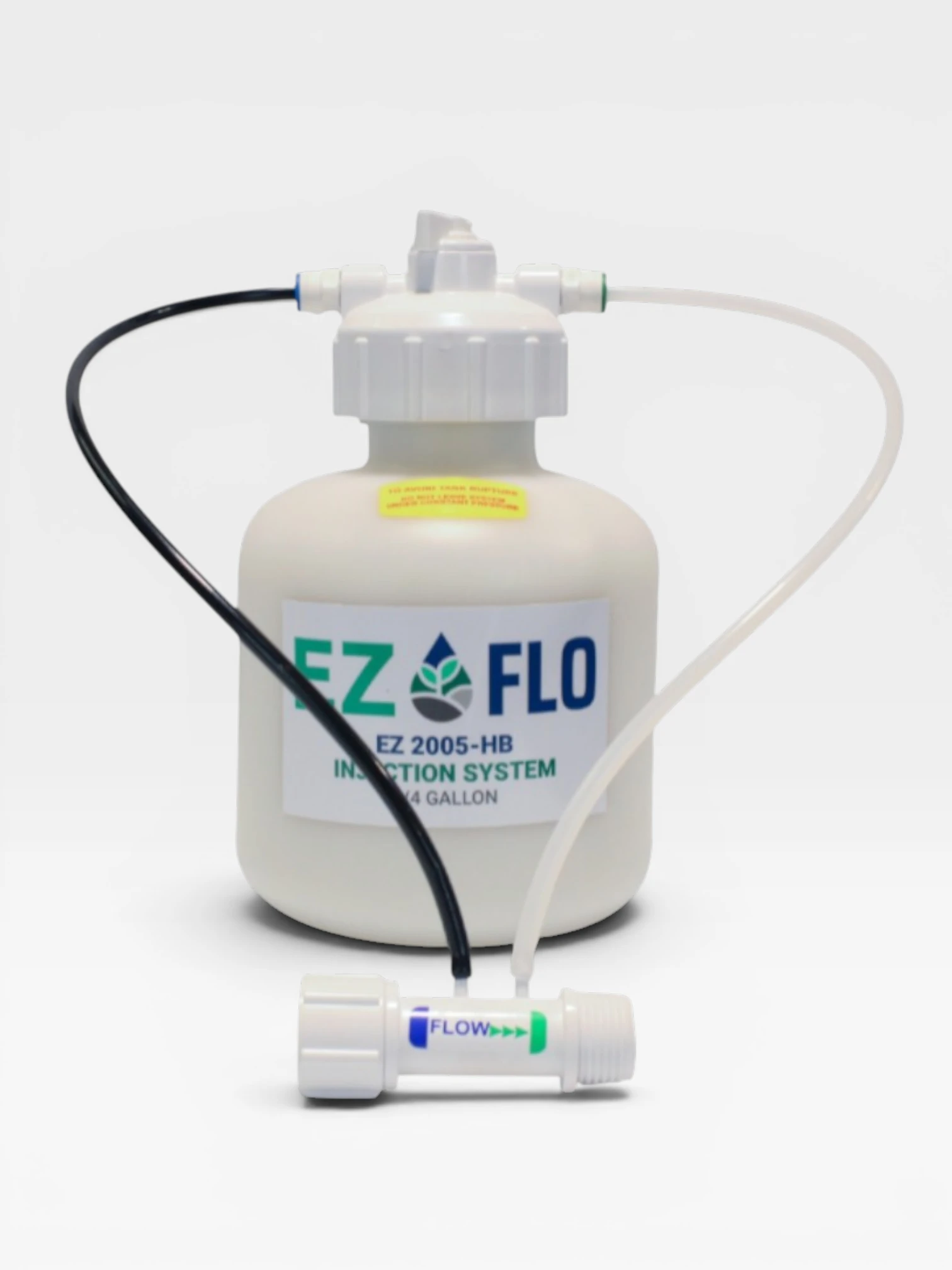 A white 3/4 Gallon EZ-FLO Fertilizer Injection System container labeled "EZ FLO Injection System" with two attached tubes, one black and one white, and a flow control valve in front.